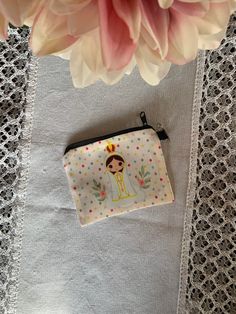 "Zipper pouch bag with a beautiful and unique design of your favorite Saint created here for you.  It's an excellent gift for First Communion or any other special date and special person. Made of polyester. Image on both sides of the piece. ✂ Size =~ 4.5\" x 3.75\" ♥♥ Colors may vary based on monitor/phone/tablet settings vs Sublimation Printer Colors.  It's a handmade item, all process made by myself, IT IS NOT a drop shipping or print on demand service.  Thank you for considering my handcrafted artwork. I'm very proud to make each piece with love... from my family to yours.  This item is made to order *All items are made in a smoke-free home. Read Shop Announcement or Shipping and Policies for Current Production time.** Rosary zipper Pouch, Saints Zipper Bag, Pencil Pouch, Coin Bag, Chil Catholic Saint, Sublimation Printer, Coin Bag, Zipper Bag, Pencil Pouch, First Communion, Drop Shipping, Pouch Bag, Special Person