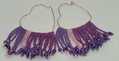 Purple and pink fringe seed bead heart earrings. miyuki delica beads. short fringe,  nickel free ear wires. Purple Fringe Beaded Earrings As Gift, Purple Fringe Beaded Earrings For Gift, Adjustable Pink Earrings With Heart Beads, Handmade Purple Heart Dangle Earrings, Handmade Purple Dangle Heart Earrings, Bohemian Pink Earrings With Heart Beads, Pink Fringe Earrings For Festival, Pink Dangle Hoop Earrings With Tiny Beads, Heart Seed Bead