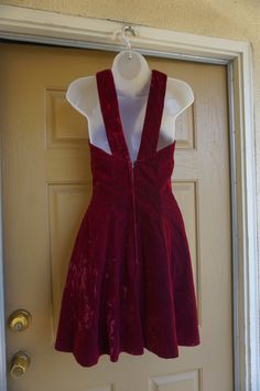 "LA Glo dress size 5/6. Please see measurements. Good condition. Measurements taken across front laid flat 16.5\" armpit to armpit 13.5\" across waist 22\" across hips 27\" length armpit to bottom" Velvet Fitted Dress For Red Carpet, Red Carpet Velvet Fitted Dress, Red Velvet Dress With Fitted Bodice, Fitted Velvet A-line Dress, Fitted A-line Velvet Dress, Red Velvet Dress For Holidays, Holiday Red Velvet Dress, Fitted Red Velvet Mini Dress, Red Sleeveless Velvet Evening Dress