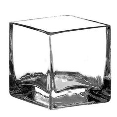 a glass cube sitting on top of a table