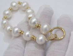 Material : 10-11mm Natural White Freshwater Pearls in Gold Plated Clasp Quantity : ONE Piece Bracelet Color : Natural White Freshwater Pearl Pearl Shape : Semi Round / Potato as pictured Length : 17.5 cm (7 inch approx.) ** If you need larger or smaller on the length of the bracelet, please feel free to convo us, thank you for shopping with us ** Lead Time & Shipping : We will ship your order in 1-2 business days to you once we received your order. FREE DOMESTIC shipping via USPS First Class White Pearl Bracelet With Lobster Clasp And Round Beads, White Pearl Bracelet With Lobster Clasp, White Beaded Round Bracelets For Anniversary, One Piece Bracelet, Bridal Pearl Bracelet, Bridal Bracelet Pearl, White Pearl Bracelet, Freshwater Pearl Bracelet, White Freshwater Pearl