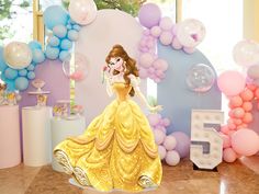 there is a princess standing in front of balloons