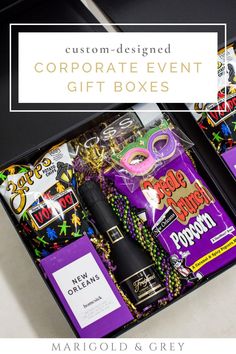 an open gift box with purple and black items in it, the text reads custom designed corporate event gifts