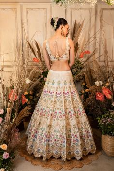 Get ready for your spring wedding with Bahar! Bahar features an ivory hand-embroidered floral lehenga paired with a matching blouse and lavender dupatta with a floral border.by Chamee and Palak. DELIVERY TIMEPlease allow 4-6 months for your outfit to arrive. FABRIC DETAILSRaw silk, Net. Cream Bollywood Lehenga With Floral Embroidery, Festive Off White Lehenga With Floral Embroidery, Festive Cream Lehenga With Floral Embroidery, Festive Cream Choli With Floral Embroidery, Off White Anarkali Lehenga With Floral Embroidery, Traditional Cream Choli With Floral Embroidery, Cream Floral Embroidered Sharara For Wedding, Cream Floral Embroidery Sharara For Wedding, Semi-stitched White Gown With Floral Embroidery