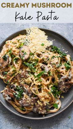 creamy mushroom kale pasta with parmesan cheese on the side and text overlay