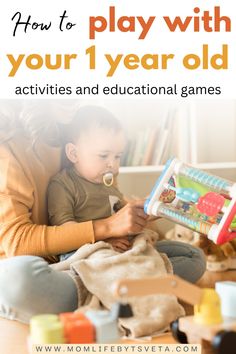 a woman playing with her toddler while sitting on the floor in front of a bookshelf