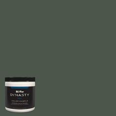 a can of paint that is dark green