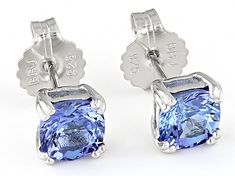 2.39ctw Cushion Tanzanite Rhodium Over Sterling Silver Stud Earrings. Measures Approximately 0.23"L x 0.23"W. Push backings. White Gold Tanzanite Earrings With Brilliant Cut, Anniversary Tanzanite Earrings With Prong Setting, Classic Silver Tanzanite Earrings, Classic Tanzanite Earrings For Anniversary, Silver Tanzanite Earrings In Fine Jewelry Style, White Gold Tanzanite Earrings As A Gift, Silver Tanzanite Earrings Fine Jewelry, Tanzanite Earrings With Prong Setting, Silver Diamond Cut Cushion Cut Earrings