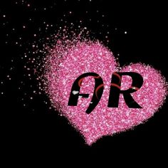 a pink heart with the word g r on it