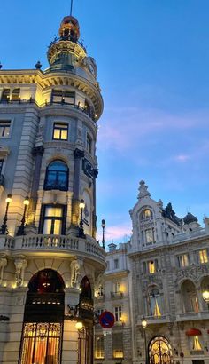 an ornate building lit up at night