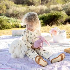 Step into the world of hassle-free dressing with our delightful Bunny Workshop Daywear Romper! Gone are the days of dealing with snaps and fussy fastenings. Our romper boasts an easy-on, easy-off design, ensuring dressing your little one is a breeze. This product features a convenient option to either tuck-in the shirt for added comfort or leave it out for a stylish drop cut, providing an easy dressing experience for both you and your baby. Crafted with the softest materials, your little bunny w Casual Cotton Bubble Romper For Bedtime, White Spring Bodysuit For Bedtime, Casual Spring Onesie For Playtime, Casual Spring Bodysuit For Playwear, Casual Spring Playwear Bodysuit, Spring Onesie For Playdate, Cute Spring Onesie For Bedtime, Casual Spring Bedtime Onesie, Casual Onesie For Spring Sleepover