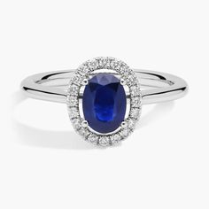 an oval shaped blue sapphire and diamond ring