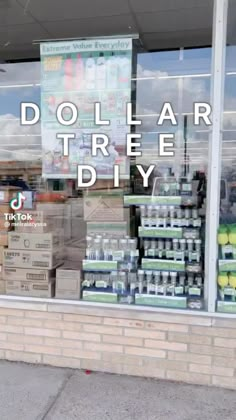 there is a store front window with the words dollar tree diy that does not look like a dollar tree