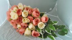 a bouquet of flowers sitting on top of a white chair