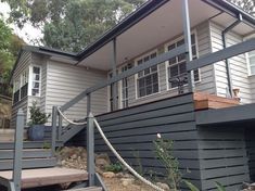 a house with stairs leading up to it