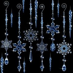 snowflakes and ornaments are hanging from chains