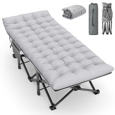 an image of a bed set up with mattresses and sleeping bag on it's side