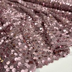 💗Sequin Fabric Dusty Rose Color, Dusty Rose Full Sequin Fabric, Fabric for Party Dress,  Glitz Full Sequins on Black Mesh (140 cm Width/1.53 yards/55 inch)💗 Unleash Your Sparkle with Sequin Fabric!✨ Elevate your style game with our dazzling sequin fabric, tailor-made for creating captivating clothing pieces. With a generous width of 140 cm or 1.53 yards or 55 inches wide, our sequin fabric adds a touch of radiance to your designs. Perfect for fashion-forward individuals and dressmaking enthusi Pink Sequin Fabric For Evening Party Season, Pink Shimmer Sequin Fabric, Party Shimmer Tulle Fabric, Fitted Sequined Tulle Fabric For Party, Festive Purple Sequin Fabric For Party, Glamorous Fitted Tulle Fabric For Party, Elegant Festive Fabric And Notions For Parties, Pink Sequin Fabric For Festive Celebrations, Elegant Pink Fabric For Party