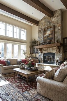 a living room filled with furniture and a fire place in front of a stone fireplace