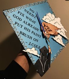 a graduation cap with the words no need to fix what god already put his paint brush on j cole