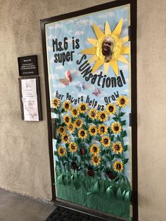 a door decorated with sunflowers and the words msd is super national