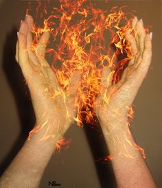 two hands are shown with fire in the middle and on top of them, both holding their hands together