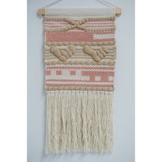 the wall hanging is made out of woven material