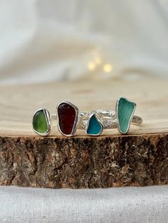 Best seller, over 250 rings sold in 2023! We are a UK-based business and each ring is made to order. *One of kind Sea Glass ring, entirely handcrafted in sterling silver (.925) and fine silver (.999). *You have a chance to select the glass colour and shape. All options were found on Seaham Beach in the UK. *The length of most glasses is from 7 mm to 10 mm, and the width of most is from 5 mm to 8 mm.  *Select your size or order the adjustable option if this is a gift and you are unsure about the size. Adjustable size for regular and open rings fit UK L-Q which are the most popular ring sizes.  PACKAGING Is it a gift for someone special ? No problem! Each product comes with a card and a jute bag. Orders can be sent directly to recipients by using their address at checkout. DELIVERY Delivery Silver Stackable Jewelry For Beach, Stackable Silver Jewelry For The Beach, Sterling Silver Beach Ring, Beach Sterling Silver Ring, Sterling Silver Beach Ring Jewelry, Nickel-free Sterling Silver Rings For The Beach, Nickel Free Sterling Silver Rings For Beach, Seaham Beach, Memory Ring