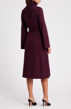 "Find JULIA JORDAN Turtleneck Long Sleeve Rib Midi Sweater Dress on Editorialist. Wide ribbing adds soft texture to this elegant sweater-dress knit with a foldover turtleneck and tethered at the waist by a matching sash. 44\" length Turtleneck Long sleeves Removable sash Unlined 78% rayon, 22% polyester Machine wash, dry flat Imported" Midi Sweater Dress, Elegant Sweater, Dress Knit, Turtleneck Long Sleeve, Sweater Dress Midi, Soft Texture, Knit Dress, Sweater Dress, Jordan