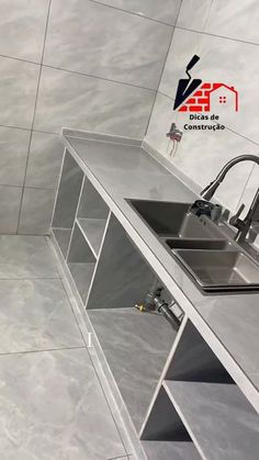 a kitchen with stainless steel sink and counter tops