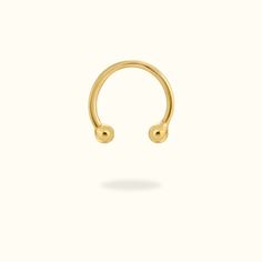 Jewelry Information: Material: 14k Gold Designed For: Septum Ring Thickness: 16g (1.2mm) Ring Diameter: 5/16 (8mm), 3/8 (10mm) Jewelry Type: Internally Threaded - One end is fixed Everyday 14k Yellow Gold Nose Rings, 14k Yellow Gold Round Septum Ring, Minimalist 14k Gold Septum Ring, Gold Stackable Septum Ring, 14k Yellow Gold Stackable Septum Ring, Gold Septum, Hinged Ring, Horseshoe Ring, Flat Back Earrings