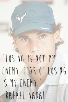 a man wearing a hat with a quote about losing is not my enemy, fear of losing is my enemy