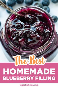 the best homemade blueberry filling in a glass jar with berries around it and text overlay that reads, the best homemade blueberry filling