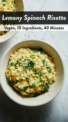 two bowls filled with pasta and spinach on top of a marble countertop next to the words lemony spinach risotto vegan, 10 ingredients, 40 minutes