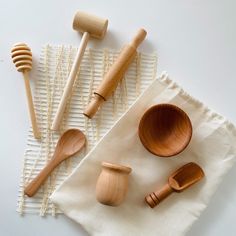 wooden utensils and spoons on a white cloth