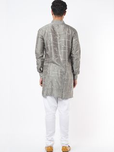 This grey silk kurta will instantly give an elegant look.  Made from blended silk fabric, this grey kurta has front buttons fastening, a mandarin collar and mirror embroidery work all over. It is paired with a white churidar pants. An ideal outfit for traditional & special events.

Size Chart For Men





	
	
					Men's Size Chart
		

		
		
						
				Size Chart For Men
				Custom Size Measurement Guide
			
			
				
				
				Custom Size Measurement Guide
1. Take your measurements at ease…don’t h Silver Kurta With Resham Embroidery For Diwali, Festive Unstitched Gray Kurta, Silver Kurta With Resham Embroidery For Festivals, Gray Straight Kurta For Festive Occasions, Fitted Silver Kurta For Festive Occasions, Festive Silver Kurta With Resham Embroidery, Festive Silver Fitted Kurta, Traditional Gray Kurta For Diwali, Bollywood Style Silver Kurta For Diwali