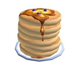 a stack of pancakes covered in syrup on a white plate with a blue ring around it