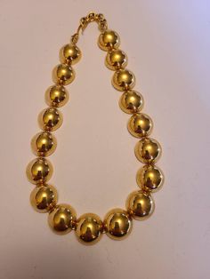 "Beautiful gold tone Monet necklace. Measures approximately 18\". Half dome disc like. Hook clasp." Vintage Gold Round Choker, Classic Gold Choker For Party, Formal Round Metal Choker, Vintage Gold Choker With Round Beads, Gold Round Costume Jewelry Choker, Gold Costume Jewelry Choker, Monet Necklace, Gold Disc Necklace, Choker Style Necklace