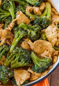 chicken and broccoli stir fry in a skillet