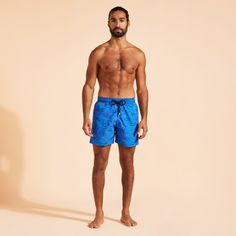 Embroidered men swim shorts, limited production, 99 pieces for the colors Storm blue, Neon blue, Navy blue and Palace blue, 192 pieces for the color red.Swimwear with elastic waistband with drawstring and silver tips (engraving 925 certified)Side pockets and back pocket with Turtle personnalized round snap buttonMen swim shorts with two back eyeletsSide leg length in M: 39.5 cm Enjoy a complimentary first repair of your swim shorts, if registered within 6 monthsFully lined with water-resistant m Blue Short-length Swimwear For Poolside, Blue Fitted Shorts For Pool, Fitted Blue Shorts For Pool, Blue Tight-fitting Shorts For The Pool, Blue Short Length Swim Trunks For Pool, Blue Swim Trunks For Pool And Beach Season, Blue Beachwear Swim Trunks For Vacation, Blue Fitted Swim Trunks For Summer, Blue Short Swimwear For Pool