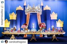 the table is decorated with gold and red decorations