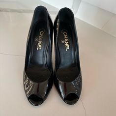 Gorgeous Chanel Heels, Great Condition! These Heels Are Preloved, Please Refer To All Pictures Prior To Purchasing. Feel Free To Ask Questions! Sz 39.5 Will Fit An 8.5/9 Evening Patent Leather Open Toe Court Shoes, Patent Leather Open Toe Court Shoes For Evening, Open Toe Patent Leather Court Shoes For Evening, Open Toe Patent Leather Court Shoes With Padded Heel, Designer Closed Toe Heels With Rubber Heel Cap, Luxury Black Heels With Rubber Heel Cap, Chanel Heels, Black Pumps Heels, Heels Black