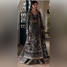 Brand: Suffuse By Sana Yasir Design: Zohreh Size: Large Chest: 22.5” Shoulder: 15.5” Shirt Length: 50.5” Pants Length: 46” Condition: Worn Only Once. Semi-stitched Naqshi Lehenga For Party, Elegant Party Lehenga With Naqshi Details, Formal Naqshi Semi-stitched Lehenga, Black Dabka Lehenga For Wedding, Black Lehenga For Eid Formal Occasion, Traditional Black Lehenga For Formal Occasions, Traditional Black Formal Lehenga, Formal Semi-stitched Naqshi Lehenga, Festive Formal Lehenga With Naqshi Detailing