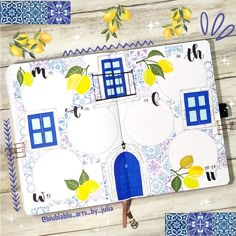 an open notebook with lemons and blue trim