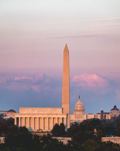 the washington monument and capitol building at sunset