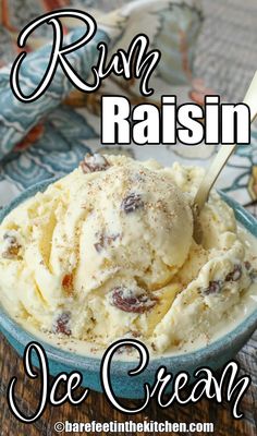 a bowl filled with ice cream on top of a wooden table