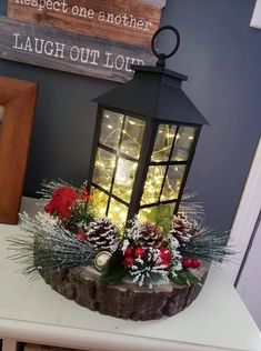 a lighted lantern sitting on top of a table