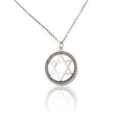 This Judaica necklace (Jewish Jewelry) is a beautiful statement jewelry. The pendant designed with the Star Of David (also known in Hebrew as the Shield of David - Magen David) the famous jewish symbol in a rounded oxidized shape. This necklace can be a lovely gift for Bar Mitzvah, Bat Mitzvah, Wedding, Birthday, Holidays gift and much more! Price includes chain *All of my designes are HANDMADE All Jewelry items are shipped inside a fancy gift box *Materials: 925 Sterling silver ♥ Come to see mo Silver Star Of David Necklace For Hanukkah, Silver Sterling Silver Necklace For Hanukkah, Hanukkah Sterling Silver Silver Necklace, Jewish Symbol, Jewish Star Necklace, Jewish Symbols, Wide Silver Ring, Judaica Jewelry, Jewish Star