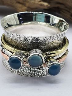 "Aqua Chalcedony Spinner Ring,925 Sterling Silver,Spinning Ring,Anxiety Ring,Chalcedony Gemstone Spinner Jewelry,Meditation Ring Spinner Ring | Anxiety Ring | Fidget Ring | Boho Ring | Meditation Ring | Dainty Ring | 925 Silver Ring | Gift For Her | Lovely Spinner Ring Metal-925 Sterling Silver This One of a kind spinner ring in sterling silver. Spinner Ring: The spinner ring is believed to come from ancient Tibetan meditation traditions, and is called a \"worry ring\" because spinning the right is believed to have a calming effect on the mind and body. Add this beautiful one little thing of galactic shine to make you feel unique and to transform your lives.Perfect for any kind of outfit and every occasion. We accept custom and personalized order. It can be change in the gemstone, ring des Tibetan Meditation, Pearl Rings Vintage, Spinning Ring, Meditation Ring, Popular Rings, Worry Ring, Spinning Rings, Marcasite Ring, Zierlicher Ring