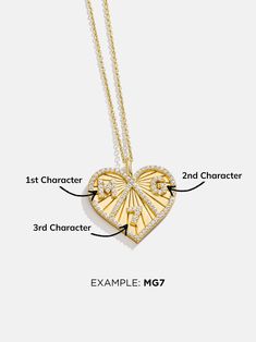 Orders placed between 11/27 - 12/4 will ship between 12/26 - 1/2/25.​Start your own tradition with the Heart 18K Gold Custom Medallion Necklace. Available in two different sizes, this heart-shaped pendant features a beautiful border of sparkly Cubic Zirconia stones. Add three special numbers, letters, or a mix of both (single digit numbers only) - the options are endless. Better yet, this piece is crafted with 18K gold plated sterling silver, meaning it'll last you a lifetime. Gold Diamond Cut Heart Pendant Necklace, Gold Diamond-cut Heart Pendant Necklace, Luxury Gold Heart Pendant Diamond Necklace, Luxury Gold Diamond Heart Pendant Necklace, Gold Diamond Cut Necklace With Heart Pendant, Gold Double Heart Diamond Jewelry, Heart Shaped Gold Sterling Silver Diamond Necklace, Gold Diamond Heart Necklace With Heart Charm, Gold Diamond Accented Heart-shaped Necklace